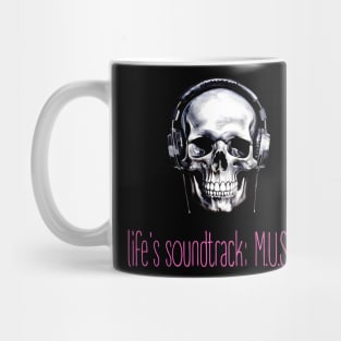 skull with headphones and text "life's soundtrack: music" Mug